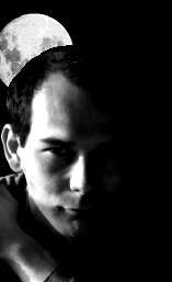 a photo of my face in space with the moon behind my head